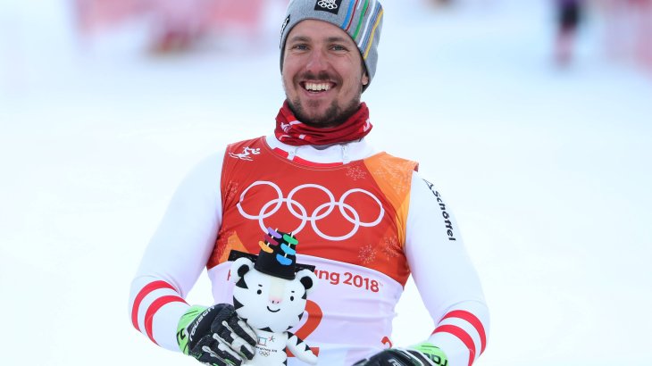 The Austrian Marcel Hirscher is pleased about his very first Olympic gold medal in the super combination. Soohorang celebrates with him.